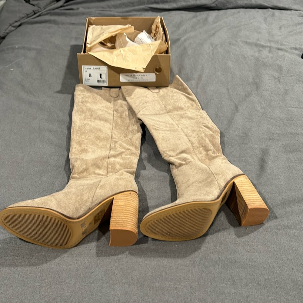 Never worn knee high boots